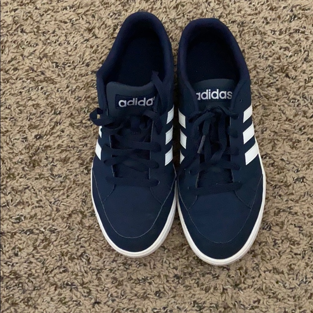 Blue adidas with white stripes 🤍